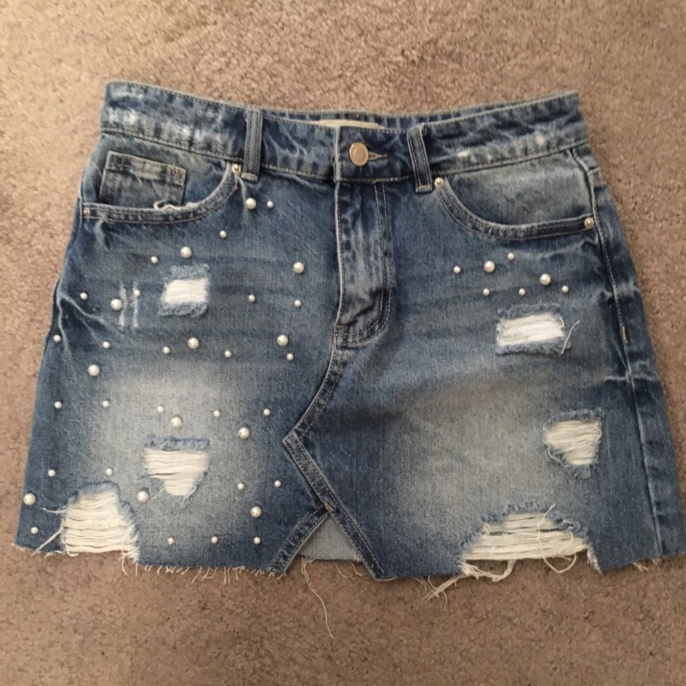 Acid wash jean skirt.